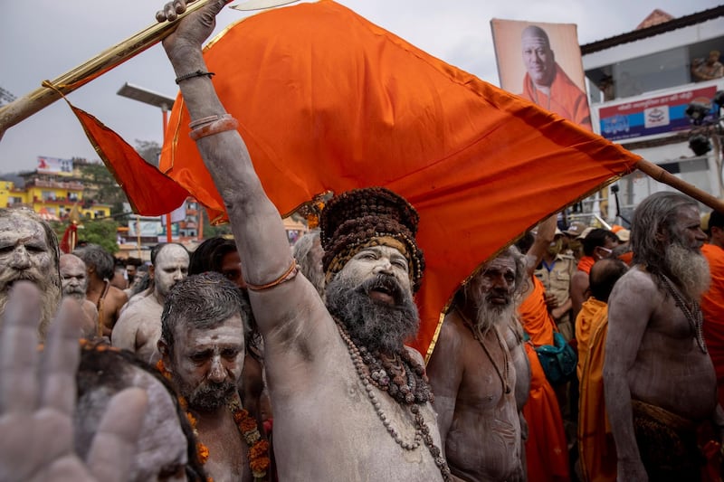 Naga Sadhus, or Hindu holy men, leave after taking a dip in the Ganges river during Shahi Snan at Kumbh Mela. Reuters