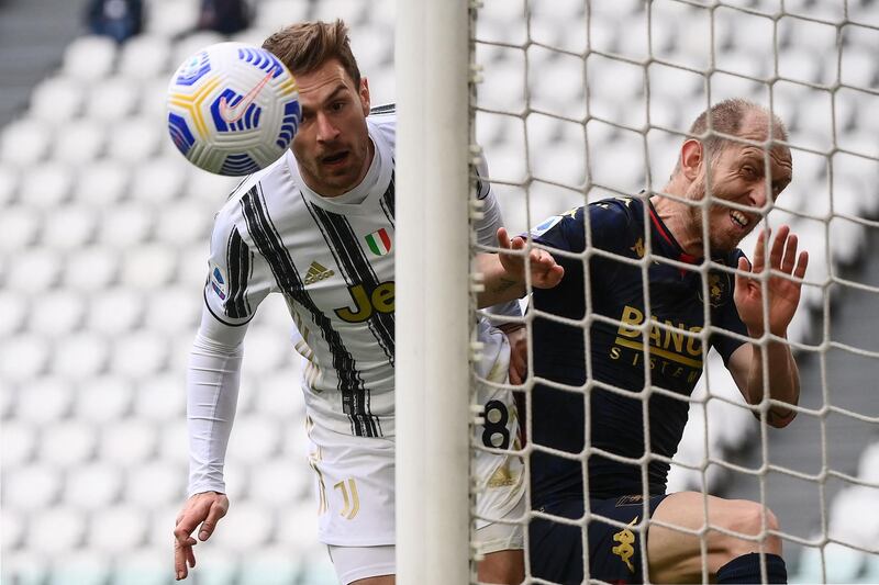 Juve midfielder Aaron Ramsey heads at goal. AFP