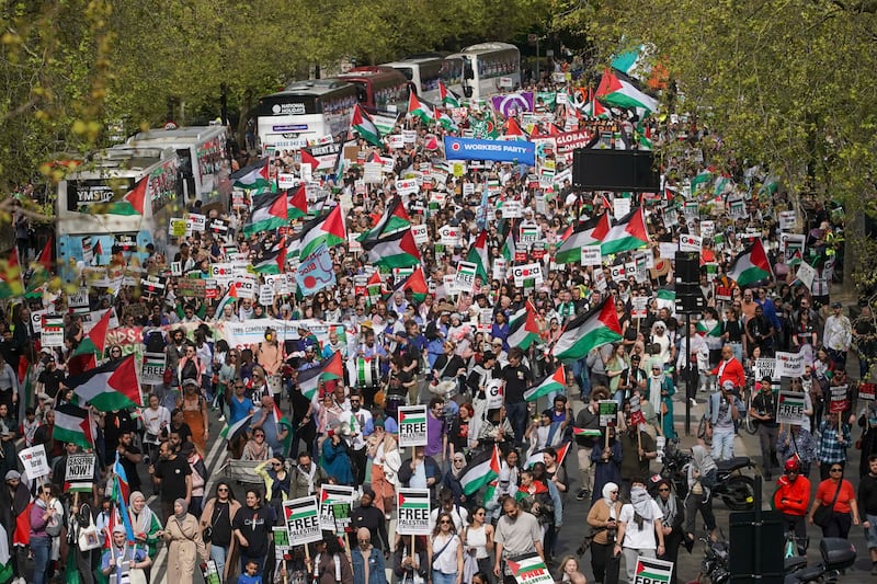 People take part in a pro-Palestine march in central London. PA