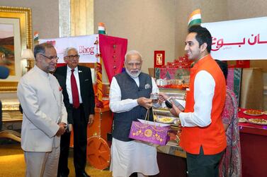 Modi visit to Emirates Palace this morning, paying for sweets with the new RuPay card.