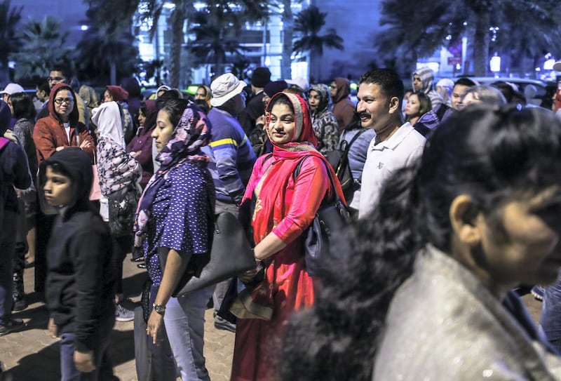 Abu Dhabi, U.A.E., February 5, 2019.   Worshipers heading onto buses at Nation Towers before they're transported to the mass.
Victor Besa/The National
Section:  NA
Reporter: