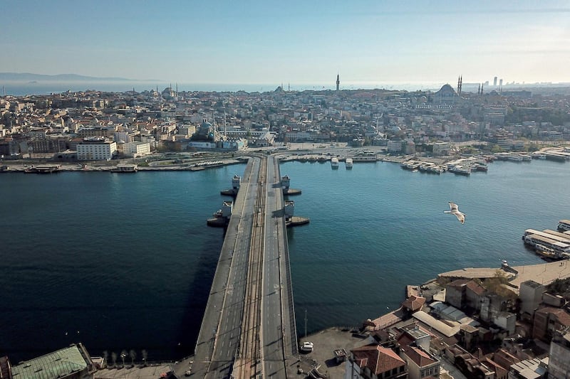 The empty Galata bridge in Istanbul, as Turkish government announced further restrictions to prevent the spread of coronavirus.  AFP