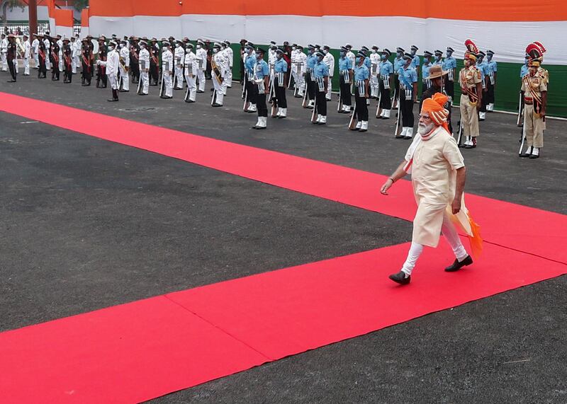 Indian Prime Minister Narendra Modi walks after inspecting the honour guard. Reuters