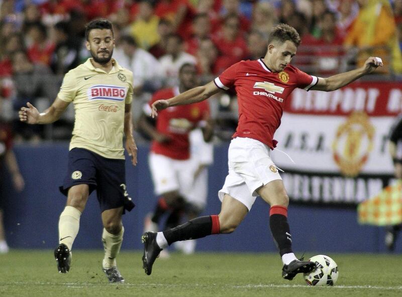 Adnan Januzaj controls the ball as he dribbles past Club America's Jose Daniel Guerrero during their friendly on Friday night. Anthony Bolante / Action Images / Reuters