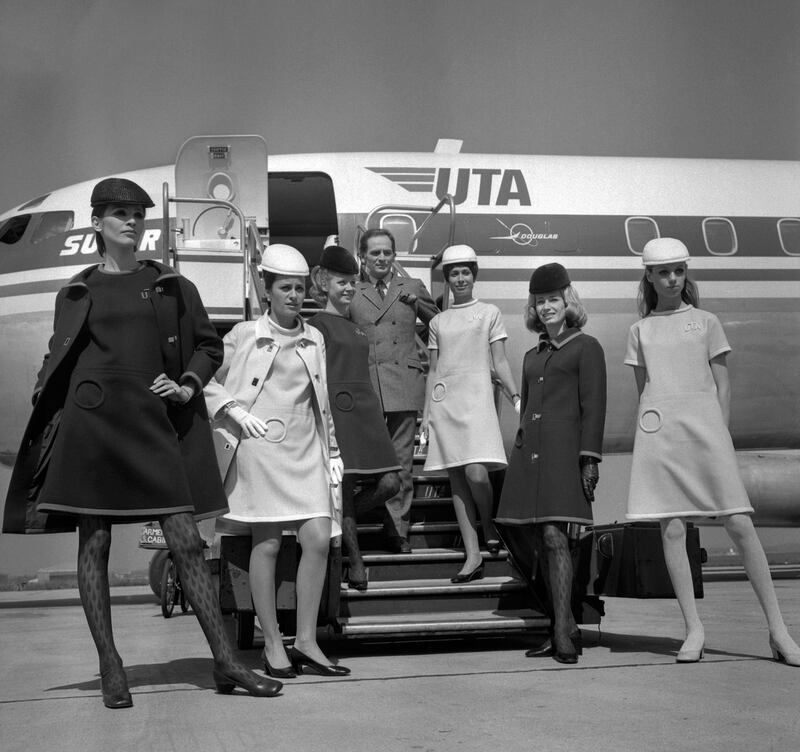 Pierre Cardin presents the new uniforms of Union de Transports Aeriens flight attendants at Paris–Le Bourget Airport in May 1968. AFP