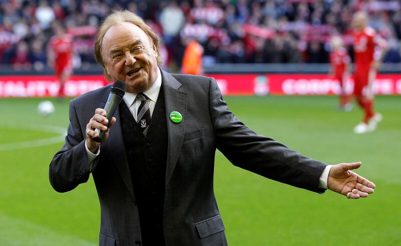 Liverpool supporter and singer Gerry Marsden sings 'You'll Never Walk Alone' before the club's English Premier League match against Blackburn Rovers at Anfield in Liverpool, in 2010. Reuters