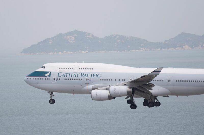 A Cathay Pacific aircraft approaches Hong Kong International Airport. Brent Lewin / Bloomberg