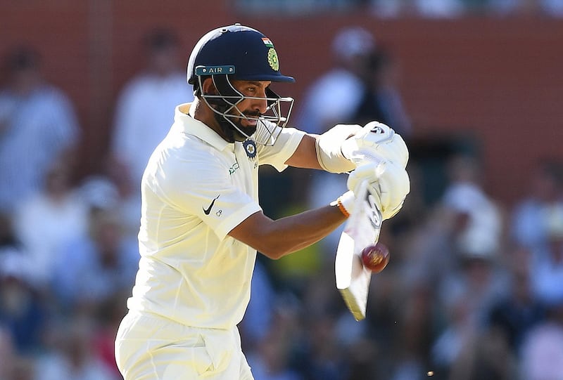 epa07211674 Indian batsman Cheteshwar Pujara plays a shot on day one of the first Test match between Australia and India at the Adelaide Oval in Adelaide, Australia, 06 December 2018.  EPA/DAVE HUNT NO ARCHIVING, EDITORIAL USE ONLY, IMAGES TO BE USED FOR NEWS REPORTING PURPOSES ONLY, NO COMMERCIAL USE WHATSOEVER, NO USE IN BOOKS WITHOUT PRIOR WRITTEN CONSENT FROM AAP AUSTRALIA AND NEW ZEALAND OUT
