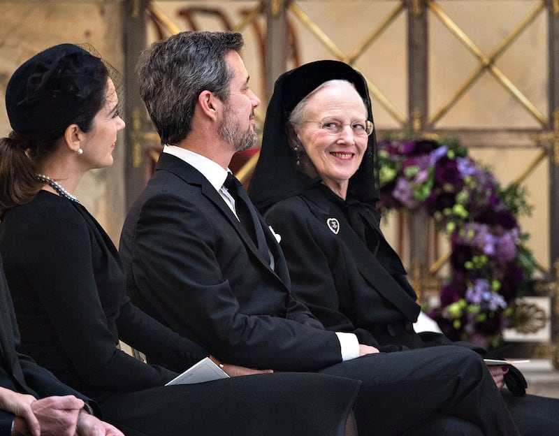 Queen Margrethe looks at Crown Prince Frederik during Prince Henrik's funeral at Christianborg Palace Church in February 2018. EPA