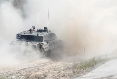 British Army Challenger tank of the NATO enhanced Forward Presence battle group based in Estonia, drives during certification field tactical exercise in Adazi, Latvia June 18, 2020. REUTERS/Ints Kalnins