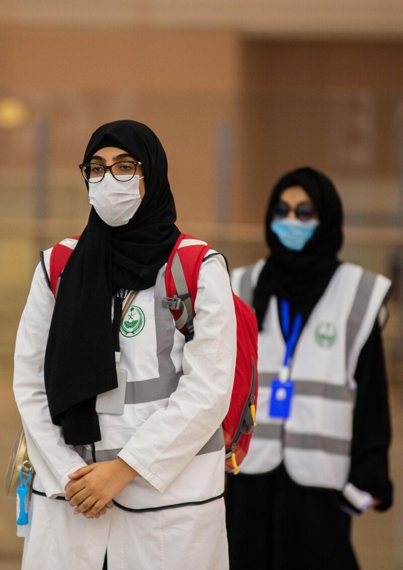 A handout picture provided by the Saudi Ministry of Hajj and Umra on July 25, 2020, shows members of the medical team from Saudi Health ministry awaiting the first group of arrivals for the annual Hajj pilgrimage, at the Red Sea coastal city of Jeddah's King Abdulaziz International Airport. The 2020 hajj season, which has been scaled back dramatically to include only around 1,000 Muslim pilgrims as Saudi Arabia battles a coronavirus surge, is set to begin on July 29. Some 2.5 million people from all over the world usually participate in the ritual that takes place over several days, centred on the holy city of Mecca. This year's hajj will be held under strict hygiene protocols, with access limited to pilgrims under 65 years old and without any chronic illnesses. - === RESTRICTED TO EDITORIAL USE - MANDATORY CREDIT "AFP PHOTO / HO / MINISTRY OF HAJJ AND UMRA" - NO MARKETING NO ADVERTISING CAMPAIGNS - DISTRIBUTED AS A SERVICE TO CLIENTS ===
 / AFP / Saudi Ministry of Hajj and Umra / - / === RESTRICTED TO EDITORIAL USE - MANDATORY CREDIT "AFP PHOTO / HO / MINISTRY OF HAJJ AND UMRA" - NO MARKETING NO ADVERTISING CAMPAIGNS - DISTRIBUTED AS A SERVICE TO CLIENTS ===
