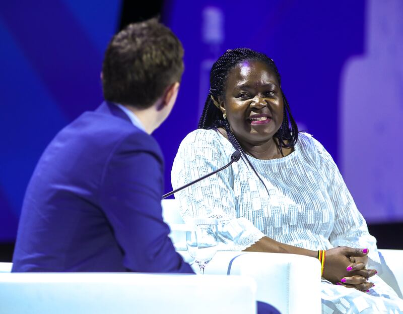 Ruth Ssentamu, Uganda's Minister of Energy and Mineral Development, responds to moderator Paul Wallace during a ministerial panel discussion on creating a 'just, equitable and sustainable future'.