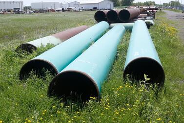 Pipeline used to carry crude oil is shown at the terminal of Enbridge Energy. Adding Inter will give Pembina additional pipeline infrastructure across Western Canada. AP 