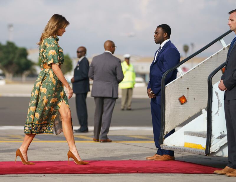 Here she is leaving Kenya in an animal print dress by an unidentified designer and Manolo Blahnik shoes.