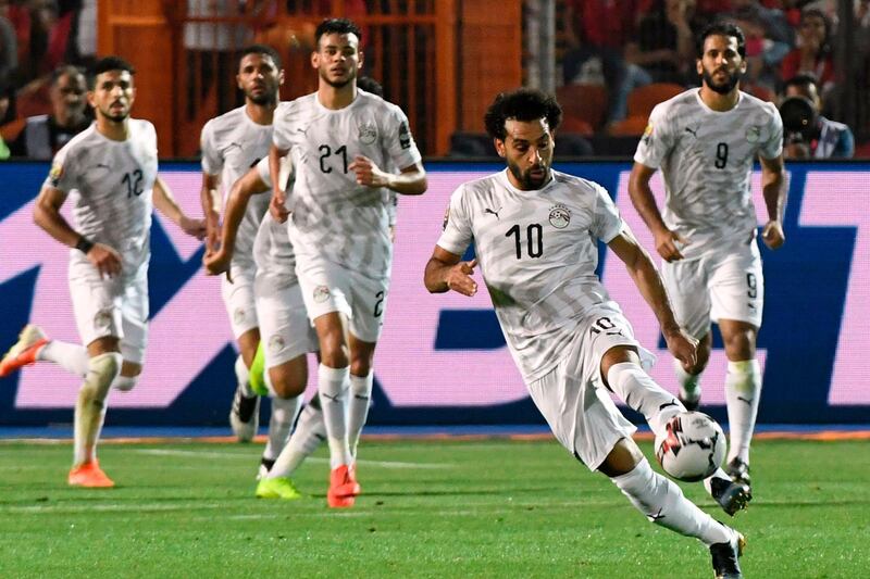 Egypt's forward Mohamed Salah runs with the ball. AFP