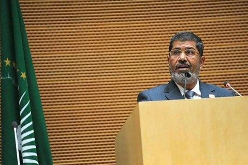 Egypt's president Mohamed Morsi addresses officials and heads of states during his milestone visit to Addis Ababa. His predecessor, Hosni Mubarak, had refused to return there after narrowly escaping an assassination attempt in 1995.