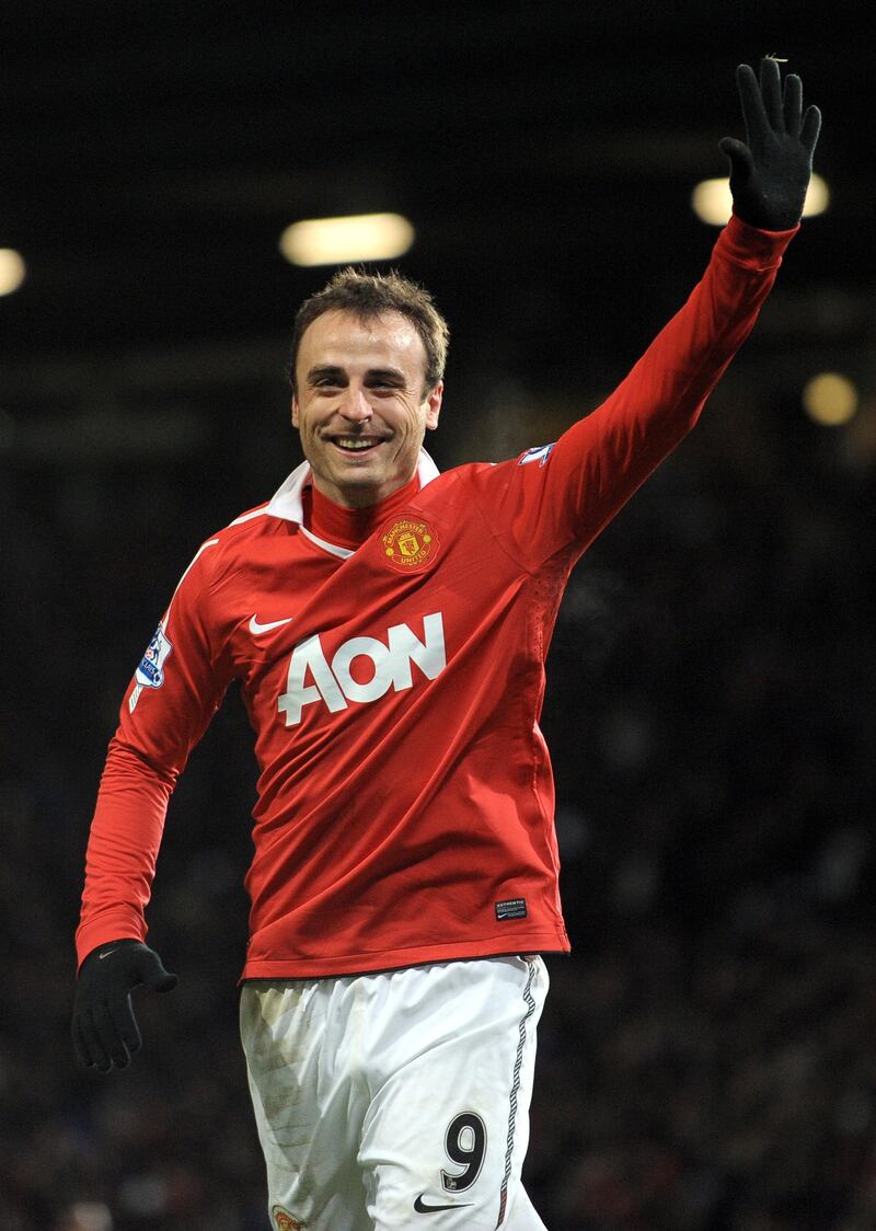 Manchester United's Bulgarian striker Dimitar Berbatov celebrates after scoring his fifth goal during the English Premier League football match between Manchester United and Blackburn Rovers at Old Trafford in Manchester, north-west England on November 27, 2010. Manchester United won the game 7-1. AFP PHOTO/ANDREW YATES

FOR  EDITORIAL USE Additional licence required for any commercial/promotional use or use on TV or internet (except identical online version of newspaper) of Premier League/Football League photos. Tel DataCo +44 207 2981656. Do not alter/modify photo (Photo by ANDREW YATES / AFP)