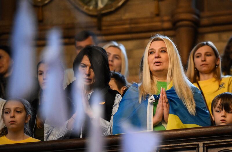 A woman during a service at the Ukrainian Catholic Cathedral in London. AFP