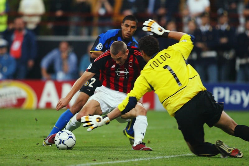 Andrei Shevchenko scores for AC Milan in the semi-final, second leg. Getty