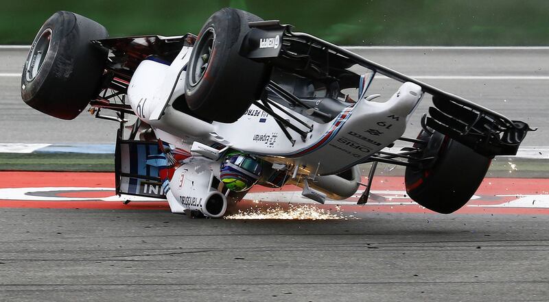 Williams Formula One driver Felipe Massa crashes at the first corner of the German Grand Prix. Reuters