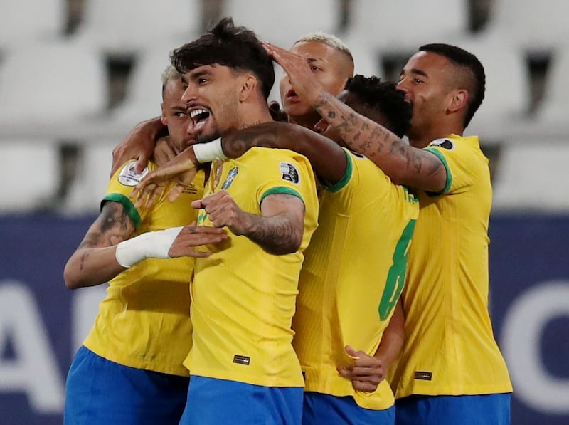 Brazil's Lucas Paqueta celebrates scoring the winning goal against Chile.