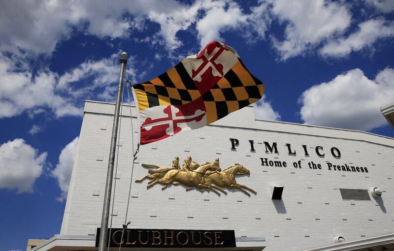 A Maryland state flag is flown prior to the 139th running of the Preakness Stakes at Pimlico Race Course on Saturday in Baltimore, Maryland. Rob Carr / Getty Images / AFP / May 17, 2014