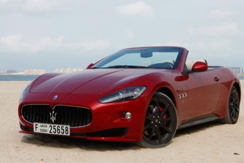 The boot space in the Maserati GranCabrio Sport is pitiful, but it will turn heads with the glorious cacophony from its engine. Jeffrey E Biteng / The National