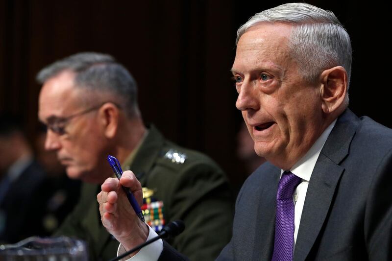 Defense Secretary Jim Mattis, right, testifies about the Department of Defense budget posture, with Joint Chiefs Chairman Gen. Joseph Dunford, left, during a Senate Armed Services Committee hearing, Thursday, April 26, 2018, on Capitol Hill in Washington. (AP Photo/Jacquelyn Martin)