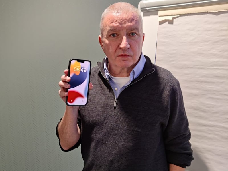 Andy Gibbins tried to use the iPhone his wife bought him for Christmas in the UK and was told it was reported stolen. Photo: Andy Gibbens