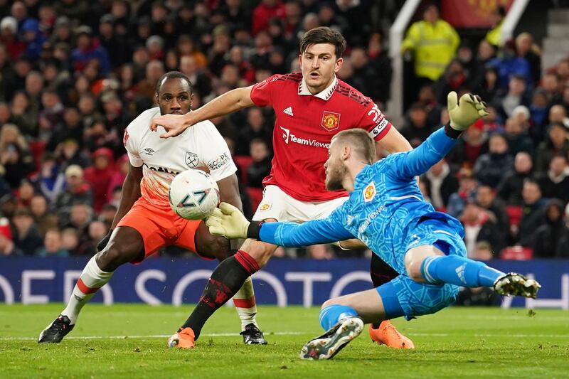 MANCHESTER UNITED RATINGS: David de Gea 7 - Stood up well and closed the angle down to save from Antonio on 23 minutes. Easier save from the excellent Benrahma, then got low to keep out Antonio again. Clawed another West Ham effort away on 50 mins but beaten by a rocket from Benrahma on 54. AP Photo