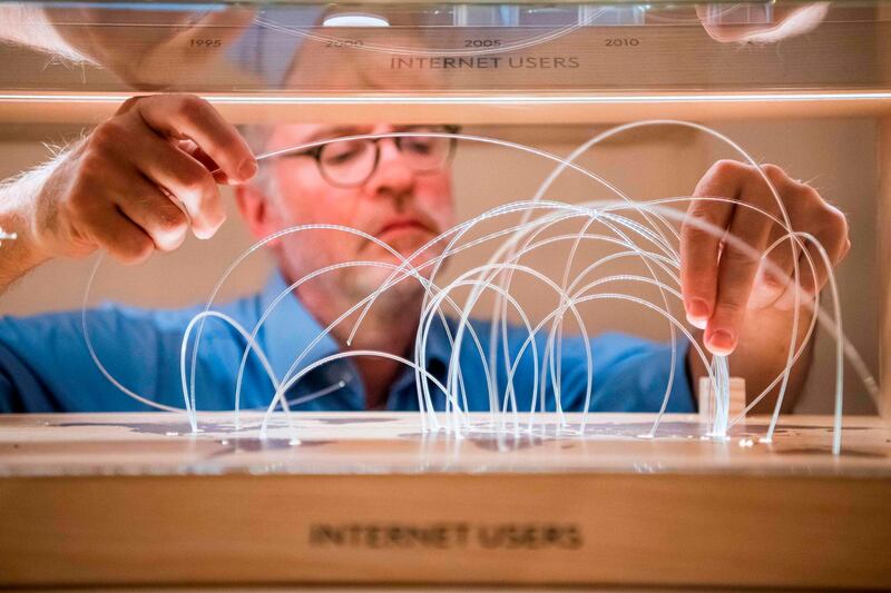 A man prepares the exhibition "For the Greatest Benefit to Humankind" at the Alfred Nobel Museum in Stockholm, Sweden on October 4, 2019.  This exhibition is about Nobel Prize-awarded achievements that have saved lives, fed humanity, protected the planet and brought people together – achievements that have been crucial to our world and our future.

 / AFP / Jonathan NACKSTRAND
