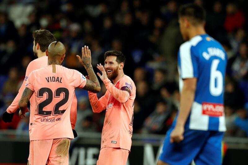 Lionel Messi celebrates after scoring against Espanyol. EPA