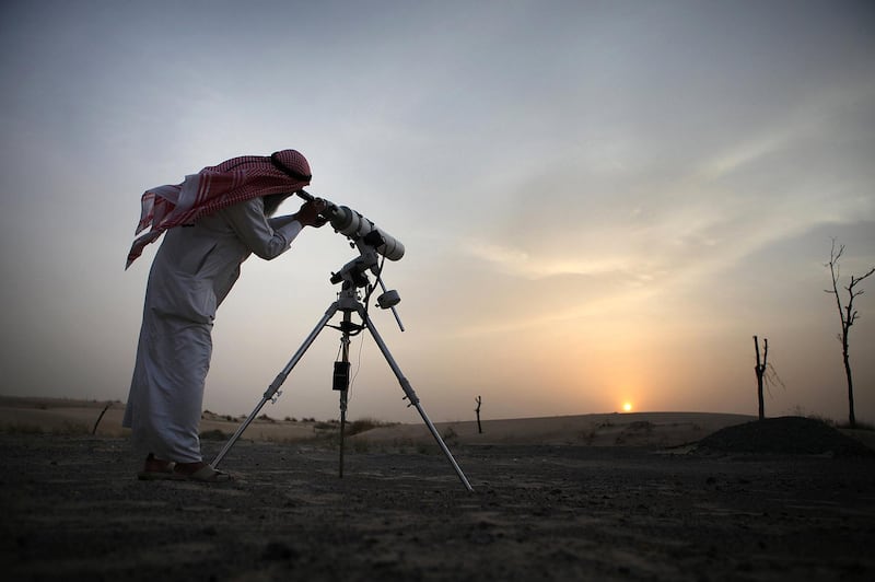 United Arab Emirates - Dubai - August 10th, 2010:  Hasan Hariri, a member of the official moon spotting team, uses his telescope to look for the moon to signal the start of Ramadan.  (Galen Clarke/The National) for observers 