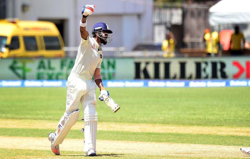 Lokesh Rahul of India celebrates after reaching a century against the West Indies on Day 2 of the second Test on Sunday. Frederic J Brown / AFP / July 31, 2016 