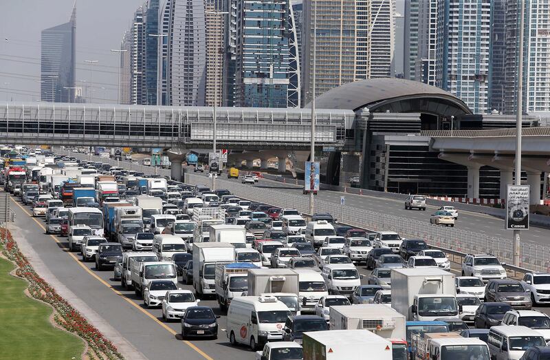 According to the updated traffic rules, which came into force on July 1, motorists are fined Dh400 and receive four black points on their licence if their backseat passengers do not fasten their seatbelts. Pawan Singh / The National