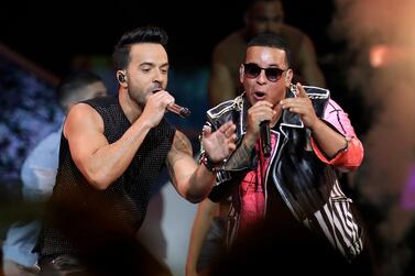 Luis Fonsi, left, and Daddy Yankee perform Despacito - the song most workers admit to getting ready to in the morning. Lynne Sladky, File / AP photo