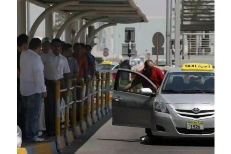 A reader wants to see more taxi ranks and orderly queuing in Abu Dhabi. Jaime Puebla / The National