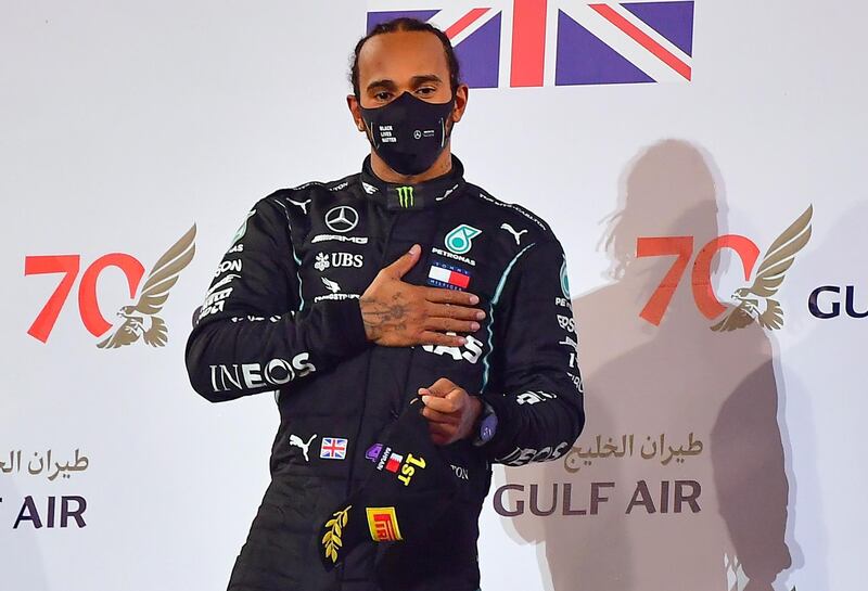 Lewis Hamilton of Mercedes celebrates winning the Bahrain GP. EPA