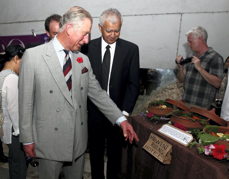 ZANZIBAR, TANZANIA - NOVEMBER 08:  Prince Charles, Prince of Wales views displays during a visit to the House of Wonders on November 8, 2011 in Zanzibar, Tanzania. The Prince of Wales and Camilla, Duchess of Cornwall are on a four day tour of Tanzania after a successful trip to South Africa. The Royal couple will be highlighting environmental and social issues during their visit to Africa.  (Photo by Gareth Fuller - Pool/Getty Images)