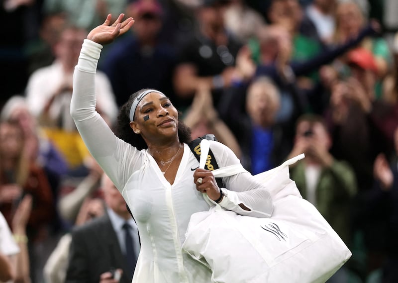 American Serena Williams leaves the court after losing her first-round Wimbledon match to Harmony Tan of France. Reuters.