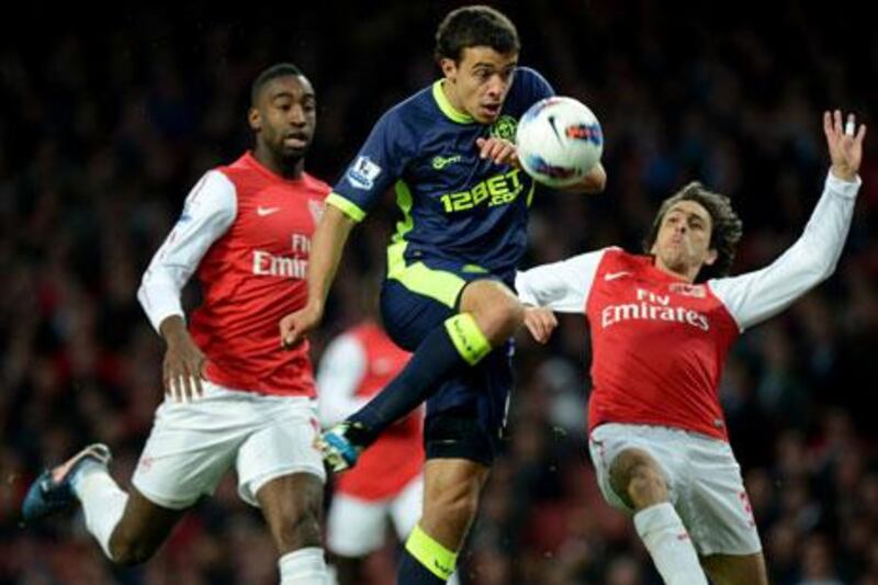 Franco di Santo, centre, scored for Wigan against Arsenal last night.