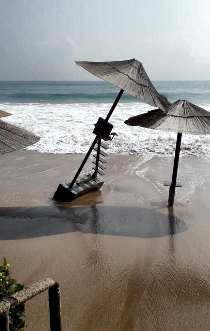 “The seawater took many of our umbrellas, sunbeds and wooden partitions that were ‎placed on the beach and destroyed our beach restaurant,” said Mr Helmy