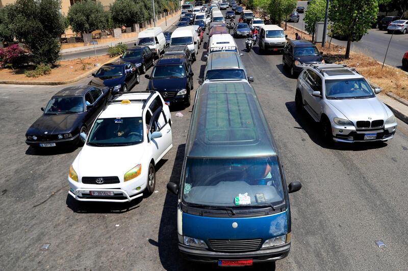 Drivers wait in a long queue for fuel in Beirut, Lebanon, where the caretaker prime minister on Friday granted approval to allow fuel imports to be financed at a rate higher than the official exchange rate, effectively reducing fuel subsidies that have been in place for decades. AP Photo