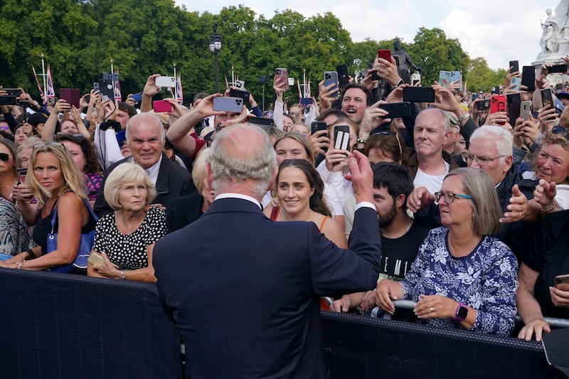 King Charles greets well-wishers at Buckingham Palace after the death on Thursday of his mother, Queen Elizabeth II. AP