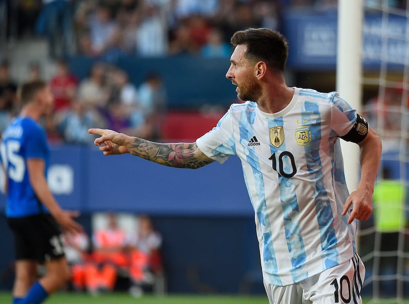 Argentina's forward Lionel Messi celebrates after scoring his team's second goal during the international friendly football match between Argentina and Estonia at El Sadar stadium in Pamplona on June 5, 2022.  (Photo by ANDER GILLENEA  /  AFP)