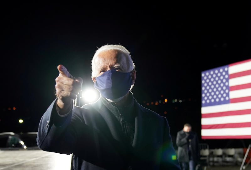 Joe Biden gestures at a drive-in campaign rally at Lexington Technology Park in Pittsburgh, Pennsylvania, US, November 2, 2020. Reuters