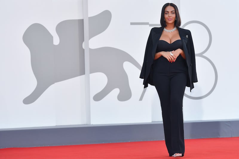 Rodriguez in a tailored trouser suit with a statement necklace at the 78th Venice International Film Festival in September 2021.  EPA 
