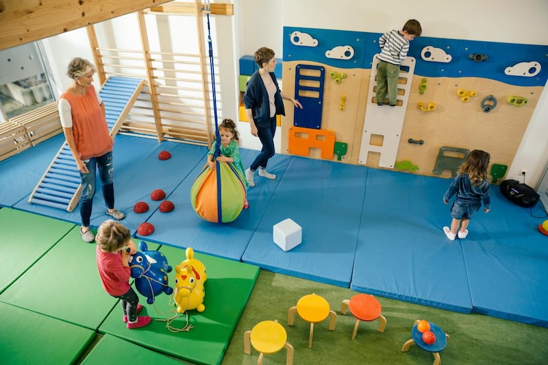 Gym room with children in Daycare center, Pre-school or Kindergarten, Cologne, NRW, Germany. Getty Images