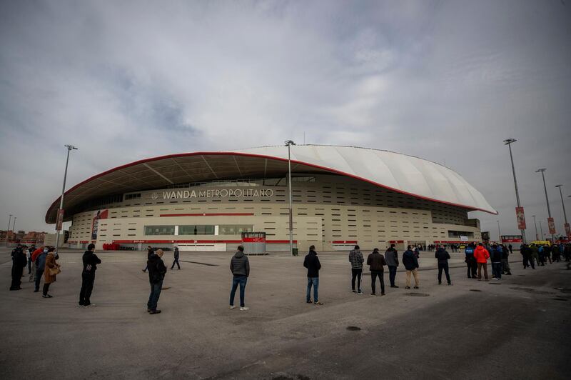 Emergency services personnel queue to be vaccinated during a mass vaccination campaign at Wanda Metropolitano stadium in Madrid, Spain. AP Photo