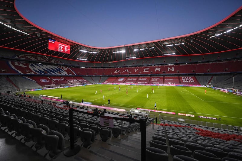 (FILES) this file photo taken on November 21, 2020 shows a general view of the empty Allianz Arena stadium during the German first division Bundesliga football match Bayern Munich vs Werder Bremen in Munich. The government of Bavaria on June 4, 2021 gave the green light for 14,000 spectators to attend Euro 2020 matches in Munich, meeting UEFA's stipulation that no European Championship games are played behind closed doors. Fans will be able to see Germany host world champions France at the Allianz Arena on June 15, 2021 facing holders Portugal four days and then take on Hungary, also in Munich, on June 23, 2021 while a quarter-final will also be held in Munich. - DFL REGULATIONS PROHIBIT ANY USE OF PHOTOGRAPHS AS IMAGE SEQUENCES AND/OR QUASI-VIDEO 
 / AFP / POOL / Lukas BARTH / DFL REGULATIONS PROHIBIT ANY USE OF PHOTOGRAPHS AS IMAGE SEQUENCES AND/OR QUASI-VIDEO 
